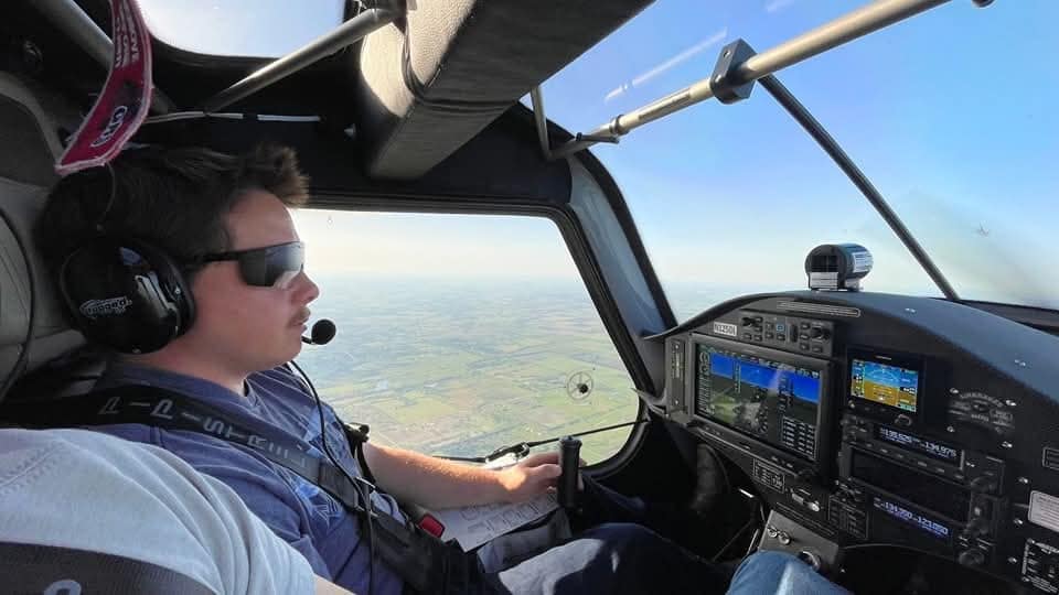 Pilot flying inside an Alpha Trainer